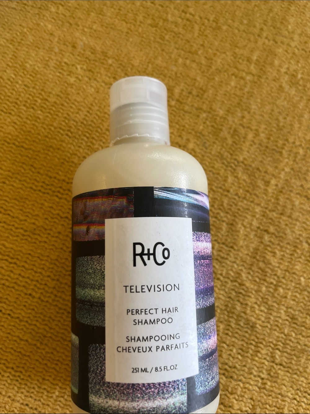 R+Co Television Perfect Hair Shampoo — White Bottle with Multicolor Label